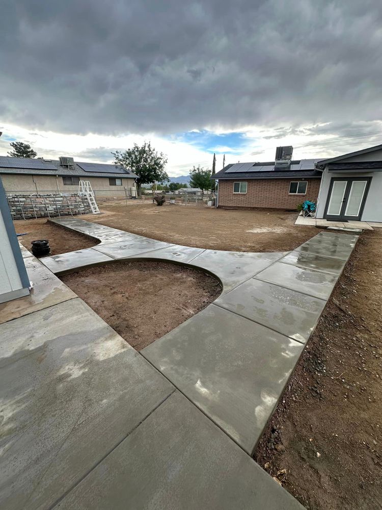 Our sidewalk installation services are expertly executed by our team of professionals, ensuring durable and visually appealing concrete pathways that enhance the beauty and functionality of your home's exterior space. for American Concrete Placement in Camp Verde, AZ