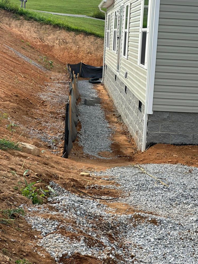 Our Residential & Commercial Excavation service efficiently handles site preparation, grading, and trenching projects with precision and care, ensuring a solid foundation for your construction needs while prioritizing safety and professionalism. for A&E Excavation in Knoxville, TN