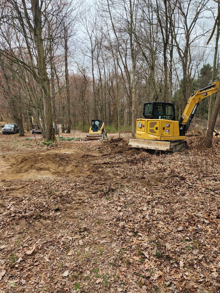 Our land clearing and site preparation service removes trees, brush, debris, and obstacles efficiently, creating a clean, stable foundation for construction, landscaping, drainage improvements throughout your residential property. for Dead On Energy in Bloomingdale, OH