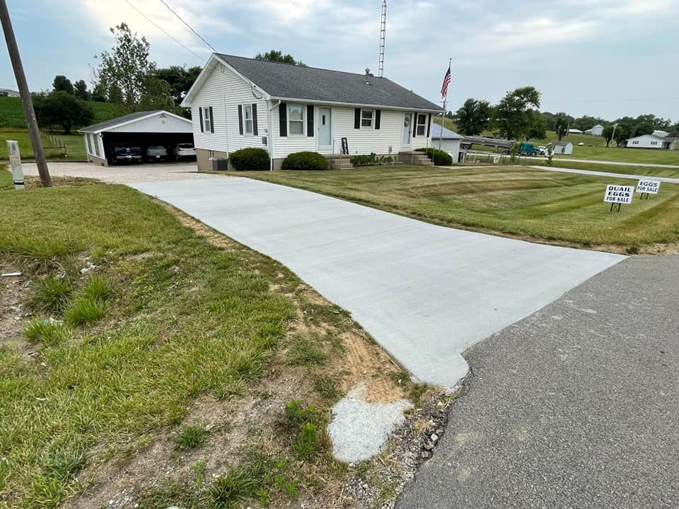 Our driveway construction service seamlessly integrates with our patio design and construction expertise to create a cohesive outdoor space, enhancing the functionality and aesthetic appeal of your home. for J&S Mowing & More in Huntingburg, IN