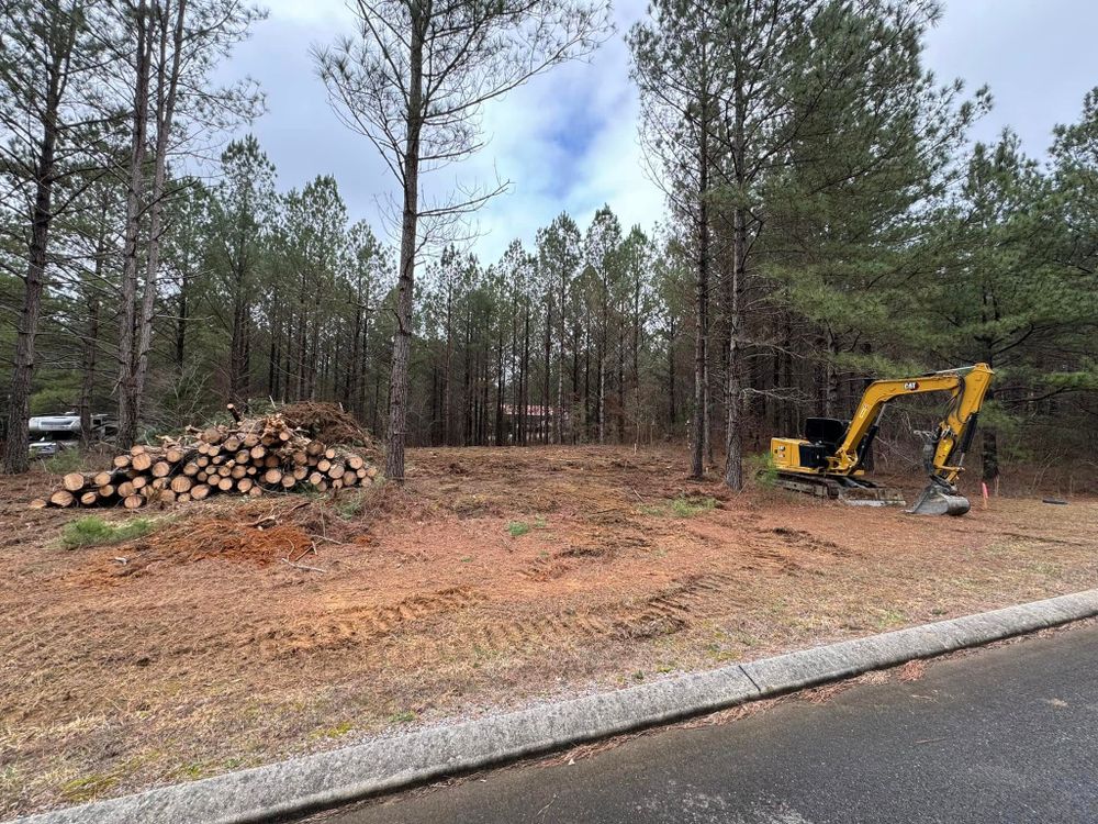 Our Land Clearing & Demolition service efficiently prepares your property for construction by removing unwanted structures and vegetation, ensuring a clean slate while prioritizing safety and environmental responsibility. for Southeast Land Services in Cleveland, TN