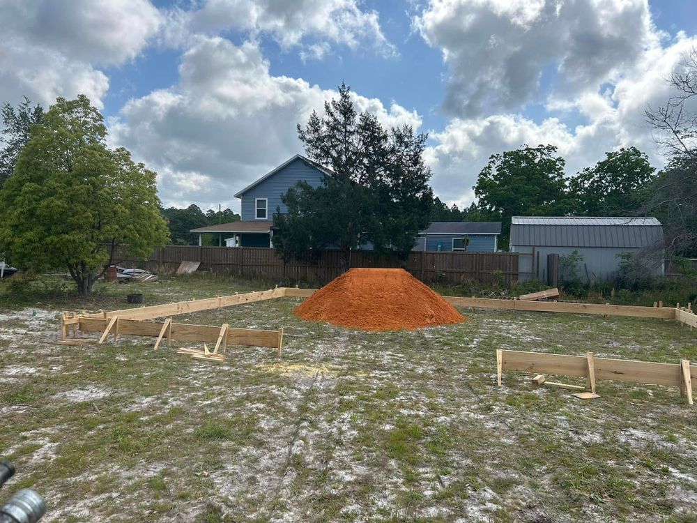 Our leveling service ensures a stable foundation by precisely grading and smoothing your land, enhancing drainage and preparing your property for construction or landscaping with expert precision. Trust us for seamless results. for Dirt for Sale-Dirt Worxs Inc in Navarre, FL