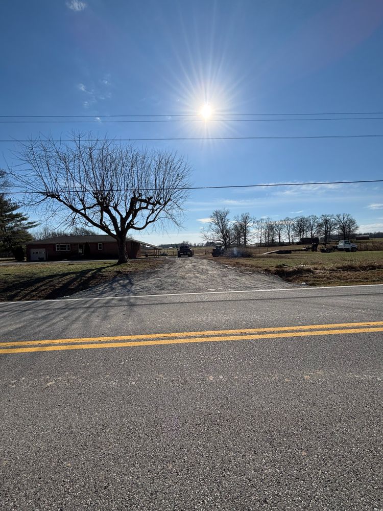 Our Driveway Construction service offers homeowners durable, aesthetically pleasing driveways by combining expert design with quality materials, ensuring easy access and enhancing property value while seamlessly integrating into the surrounding landscape. for JC Land Clearing in Shelbyville, TN