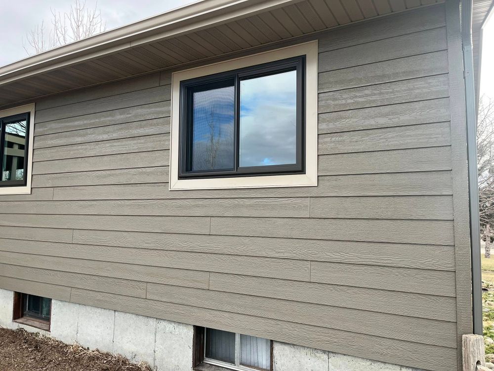 Enhance your home's curb appeal and energy efficiency with our expert vinyl siding house services. Our team offers professional installation and durable materials, ensuring a beautiful, low-maintenance exterior for years to come. for GLOC Construction in Billings, MT