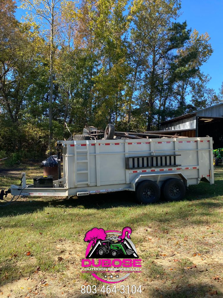 Our Debris Removal service efficiently clears construction waste, ensuring your property remains clean and safe. Trust our experienced team to handle disposal responsibly, leaving you with a tidy project site. for DuBose Outdoor Services in Sumter, SC
