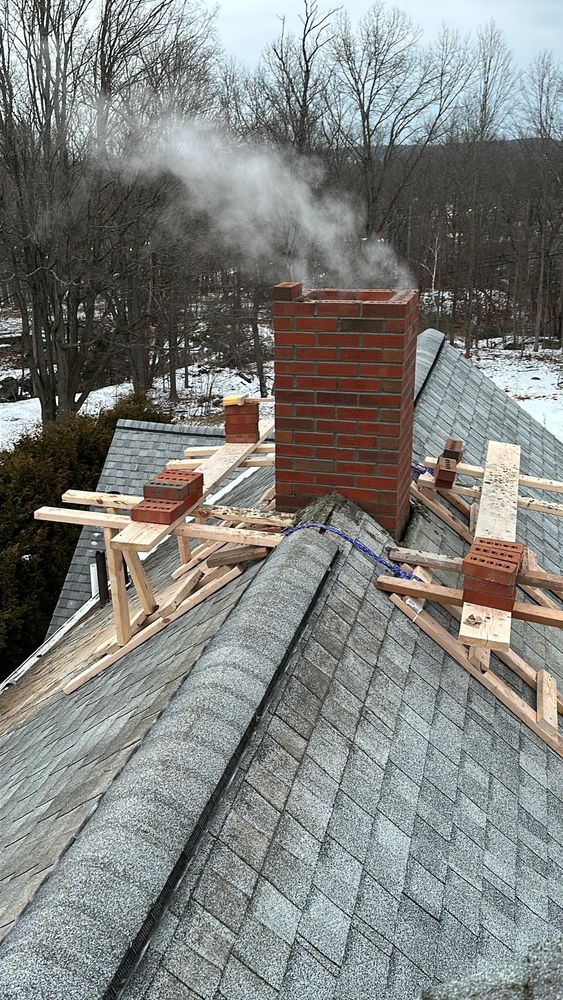 Chimney photos from restoration to new builds for All For U Roofing & Masonry in Boston, MA