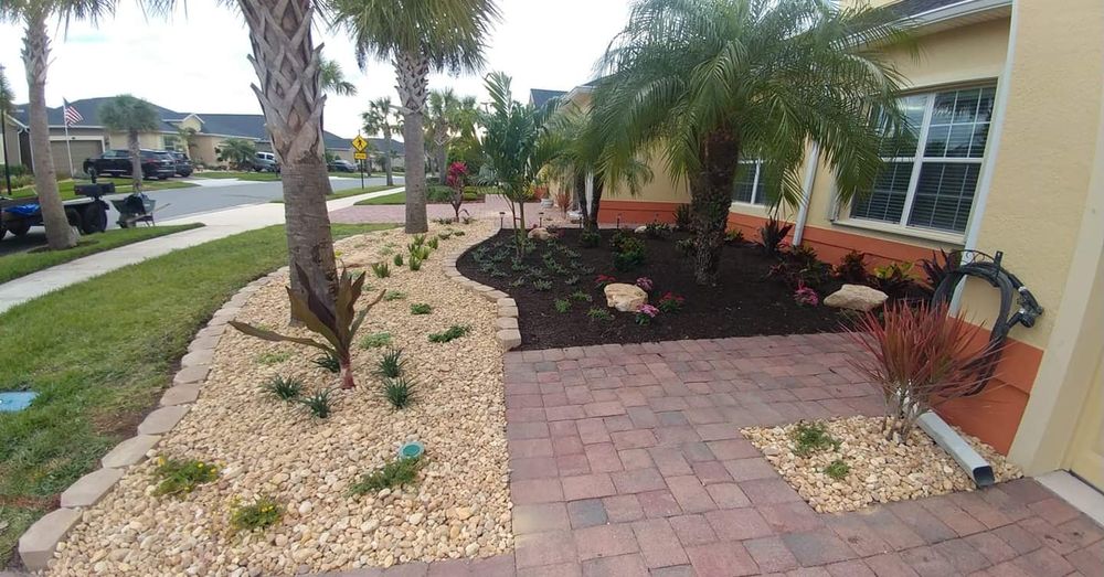 Transform your outdoor space with our professional Landscape Installation service, featuring expert mulch installation to enhance plant health and aesthetic appeal for a more vibrant and well-maintained garden. for Epic Vine Design in Melbourne, FL