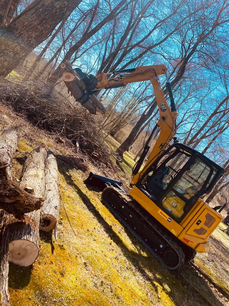 Our Debris Removal service efficiently clears your property of unwanted materials, ensuring a clean and safe environment post-excavation while saving you time and effort with our professional, reliable team at work. for Mountain Land Services LLC. in Oneida, TN