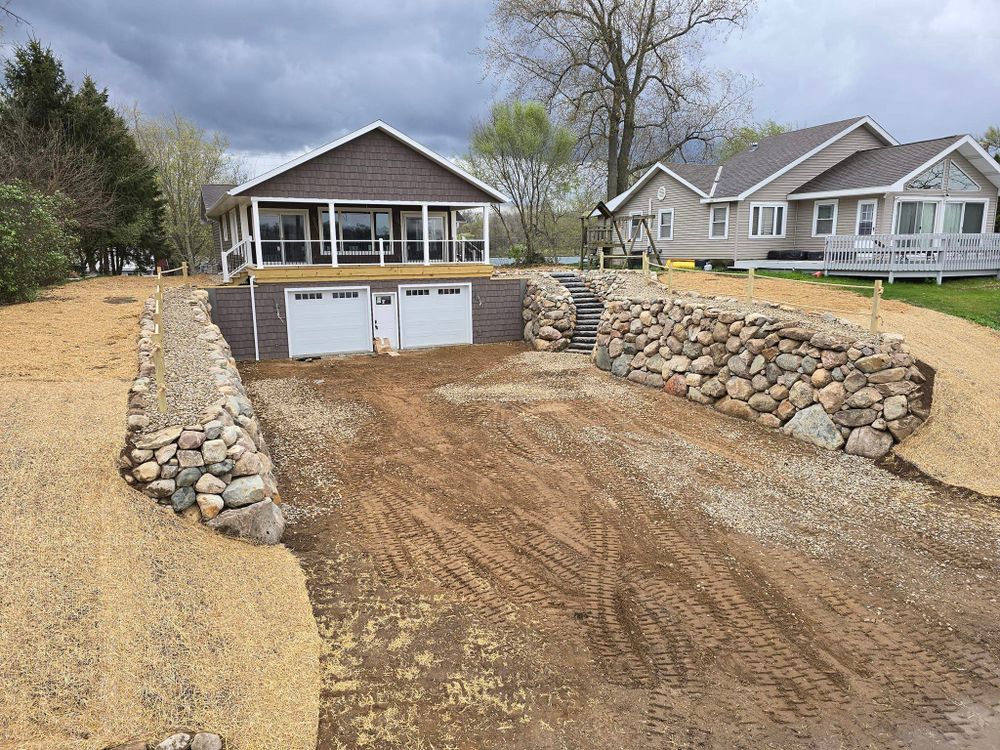 Our Driveway Design & Build service is perfect for homeowners who are looking to update their driveway with a new design or build a brand new driveway from scratch. for Michiana Boulders Landscaping & Excavating in Granger, IN