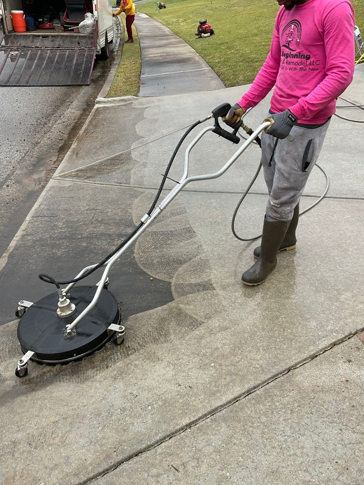 Our pressure washing service can help keep your outdoor living spaces looking pristine by removing dirt, grime, and debris from surfaces such as siding, driveways, and decks with our professional equipment. for New Beginning Landscape & Remodel LLC in Atlanta, GA