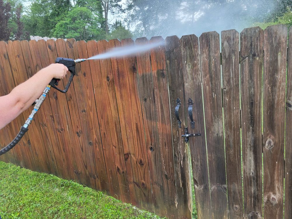 Our Fence Washing service will efficiently clean and revitalize your fence, removing dirt, mold, and grime to enhance its appearance and prolong its lifespan. Contact us for a free estimate today! for Hydro Hustle in Athens,  GA