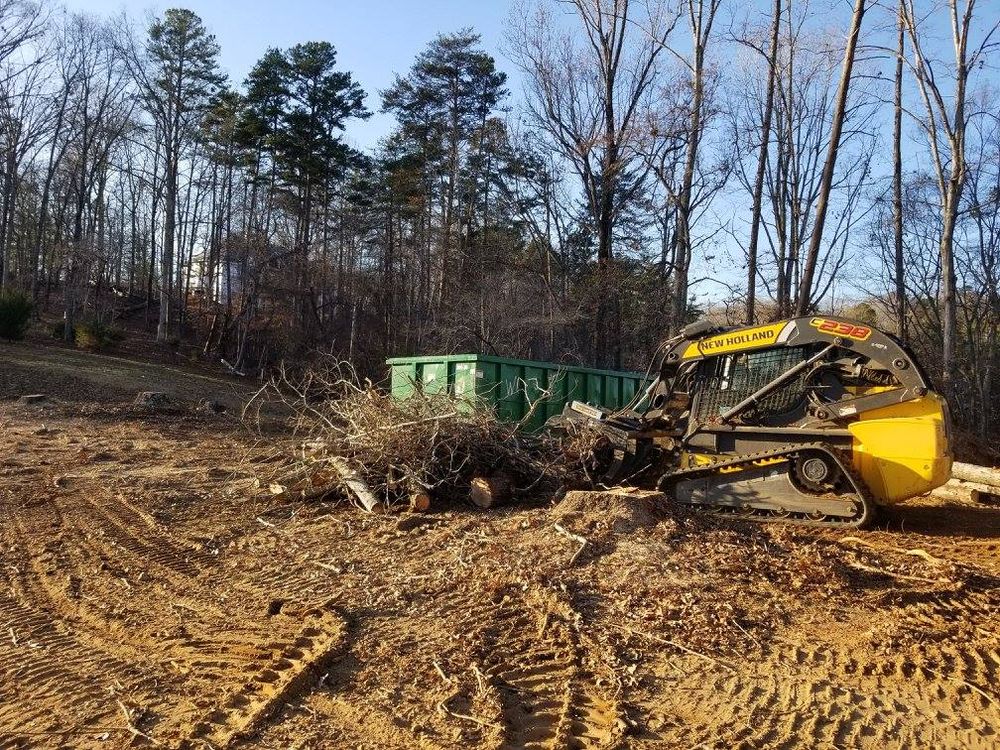 Our Land Clearing & Demolition services provide efficient removal of unwanted structures and debris, preparing your property for new projects with precision and care, ensuring a safe foundation for future development. for HC Construction & Grading in Clayton, GA