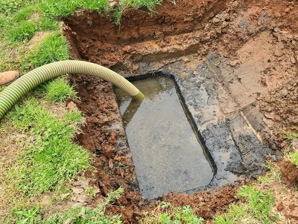 Our Septic Tank Cleaning service ensures efficient waste management by providing thorough, professional cleaning and maintenance, preventing backups and prolonging system life for a seamless home experience. for Evant Backhoe & Construction in Evant, TX