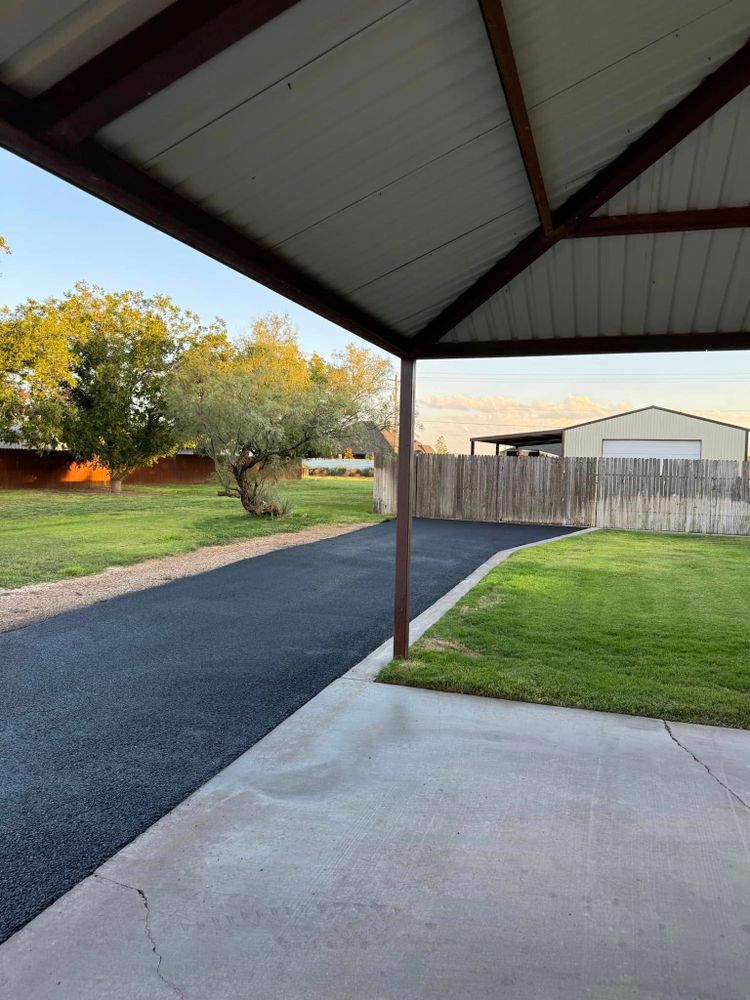 Enhance your home's curb appeal and durability with our expert asphalt driveway installation, ensuring a smooth, long-lasting surface tailored to withstand weather conditions while providing exceptional quality and customer satisfaction. for Adams Asphalt & Sealcoating in Lubbock, TX