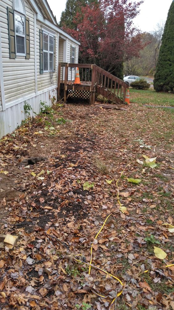 Enhance your home's curb appeal with our Fall Clean Up service, including leaf removal, garden bed care, and pruning to prepare your landscape for winter and ensure a vibrant spring resurgence. for Scott's Lawn Care and Landscaping LLC in Modena, NY