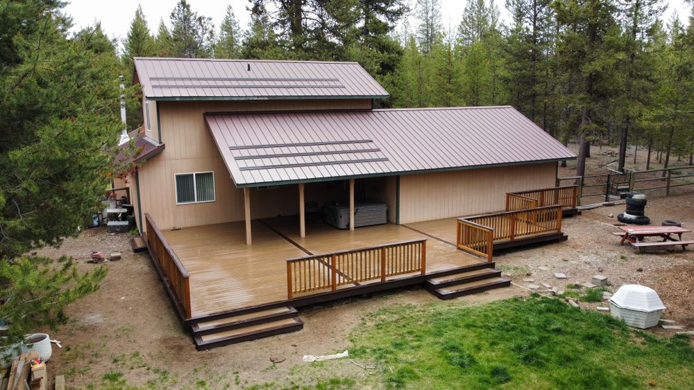 Transform your outdoor space with our expert deck and patio installation services, offering quality craftsmanship and tailored designs to enhance your home's beauty and functionality for relaxation or entertaining. for The Dec-King in La Pine, OR