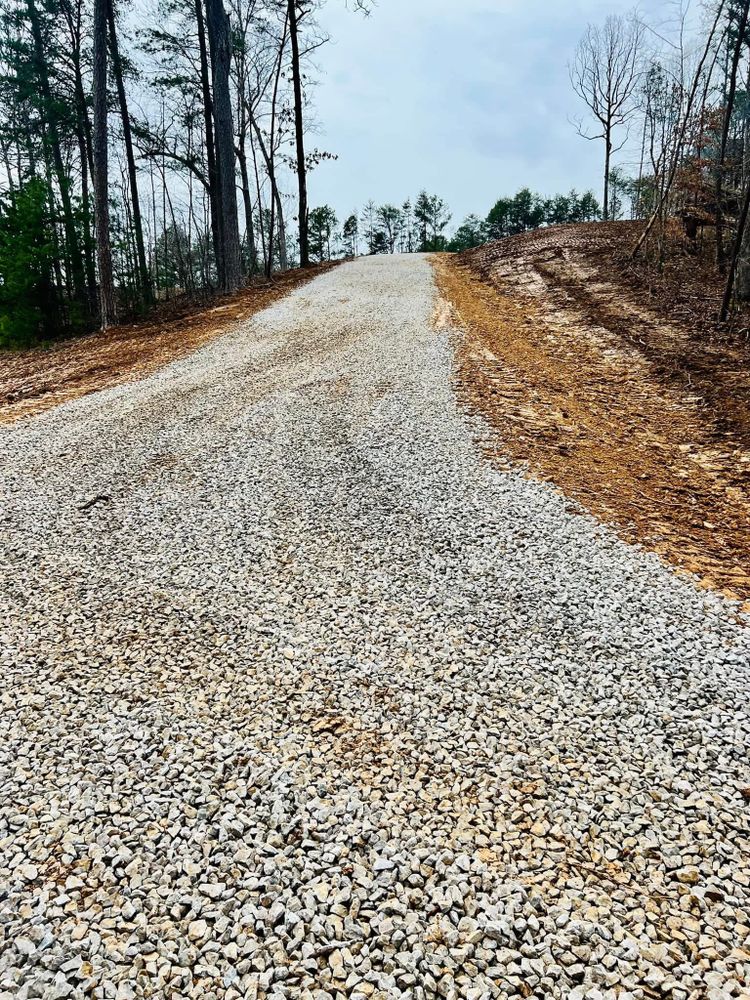 Our excavating company specializes in affordable gravel driveway installations, offering expert guidance to optimize your design while keeping your driveway cost low and ensuring a durable, attractive finish for your home. for DC Construction Company LLC in Clanton, AL