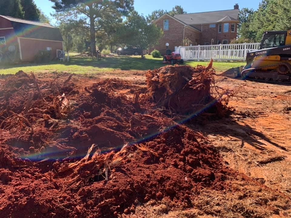 Our Debris Removal service efficiently clears construction waste, yard debris, and unwanted materials, ensuring a clean site. We prioritize safety and eco-friendly disposal for your peace of mind and property care. for KLNAX Enterprises Inc. in Social Circle, GA