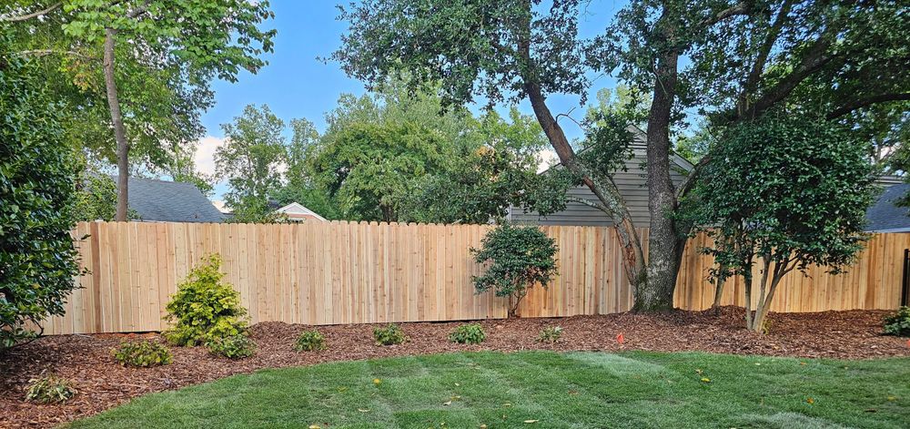 Enhance your property's privacy and security with our expert fence installation service, featuring reliable solutions for new builds and efficient fence repair to maintain the integrity of your landscape. for Tru-Love Outdoor Services LLC in Greensboro, NC