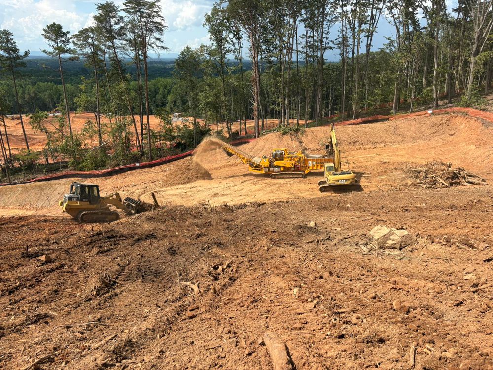 Our Excavating Company offers expert residential and commercial excavation services, ensuring precise site preparation, grading, and land clearing to support your construction projects with efficiency and reliability. for Grading & Clearing Services in Dawsonville, GA