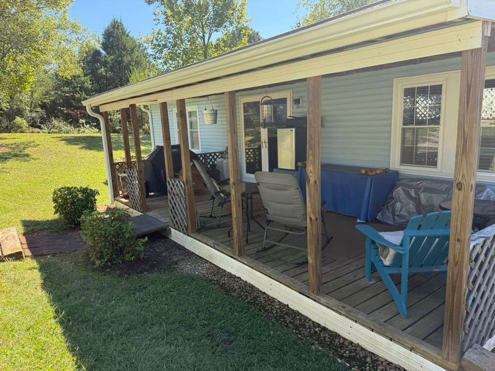 Our Replacement Gutter service complements our roof replacement services by ensuring optimal drainage and protecting your home from water damage with high-quality materials designed for durability and efficiency. for Rocky River Contractors, LLC in Charlotte, North Carolina