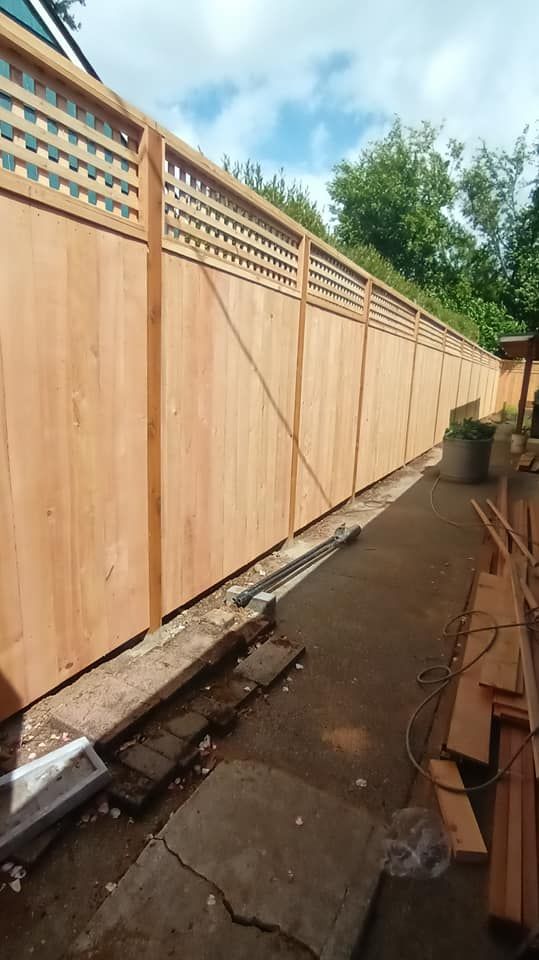 Enhance your property's security and aesthetics with our professional fence installation service, offering durable materials, expert craftsmanship, and customizable designs to perfectly fit your needs and enhance curb appeal. for Reset Construction LLC Fence & Deck Repairs in Portland, OR