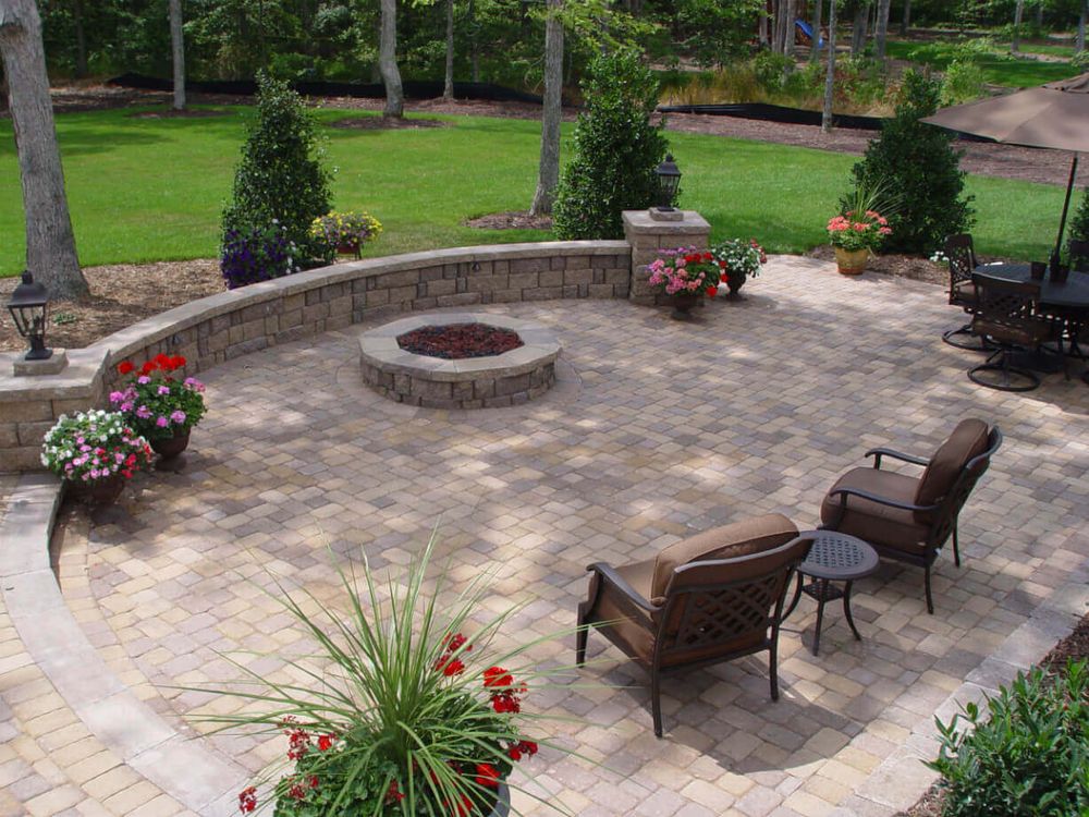 Enhance your outdoor space with our expertly crafted concrete patios. We ensure durability and stability by installing robust deck footers, perfect for any landscape design at your home. for Jr Construction in Wingate, NC