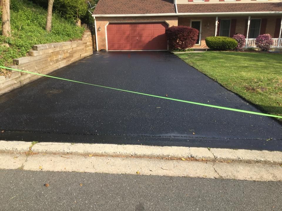 Our professional Asphalt Paving service offers homeowners a durable and smooth surface for their driveways or sidewalks, ensuring long-lasting quality and enhanced curb appeal for your property. for Mike's Macadam in Reading, PA