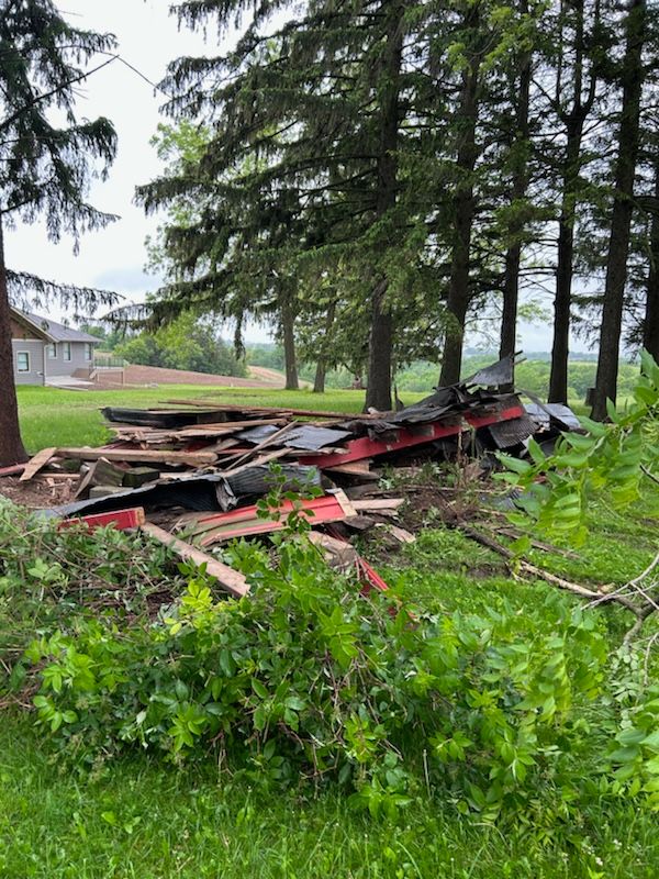 Our Demolition service offers efficient and safe removal of unwanted structures on your property, ensuring a clean slate for our landscaping services to transform your outdoor space into a beautiful oasis. for Dirty Digs Landscaping in Galesville, WI