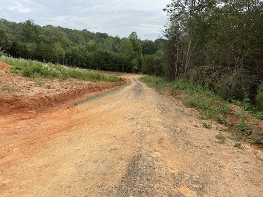 Our Dirt Work service prepares your property for projects by grading land, removing obstacles, improving drainage, and creating a clean, stable foundation for driveways, patios, landscaping, and construction. for Short Mountain Land Service in Woodbury, TN