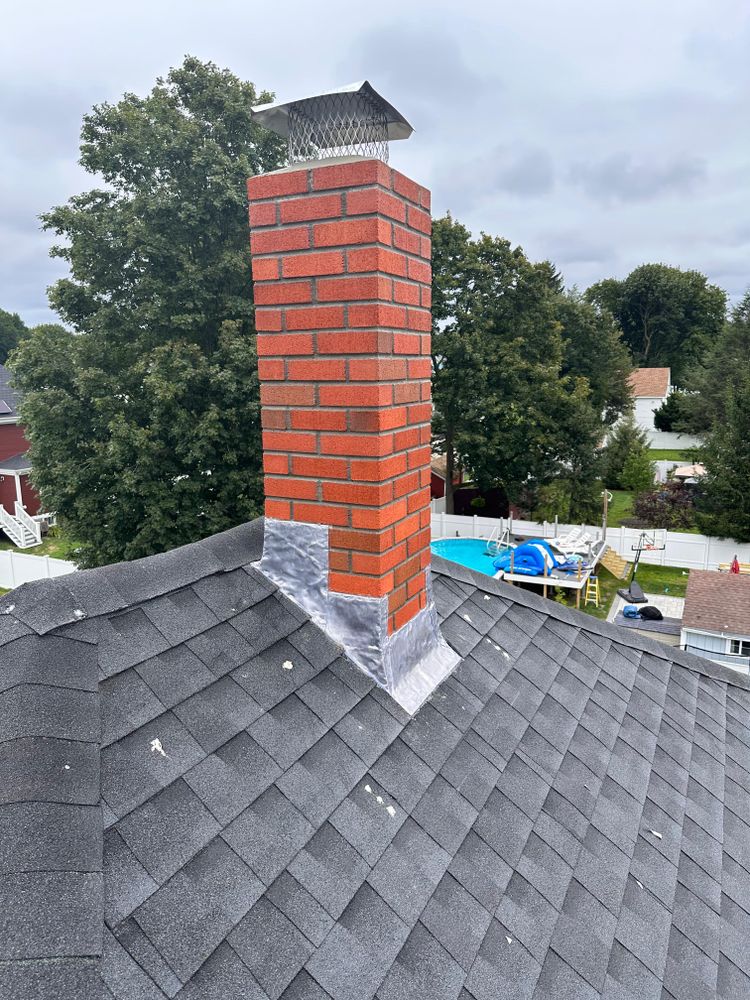 Chimney photos from restoration to new builds for All For U Roofing & Masonry in Boston, MA