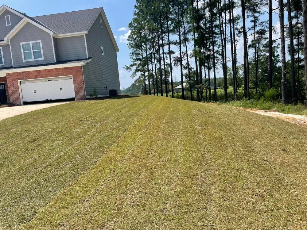 Our professional driveway construction service transforms your property by creating a durable, functional, and visually appealing driveway that enhances the overall aesthetic and functionality of your home. for Jt's Landscaping in Webb, AL