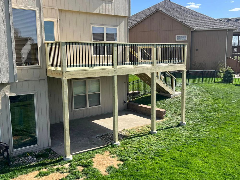 Our deck rebuild service offers homeowners the opportunity to enhance and upgrade their outdoor spaces with a brand new, durable deck that will add value and aesthetic appeal to their property. for Done Right Decking in Leavenworth, KS