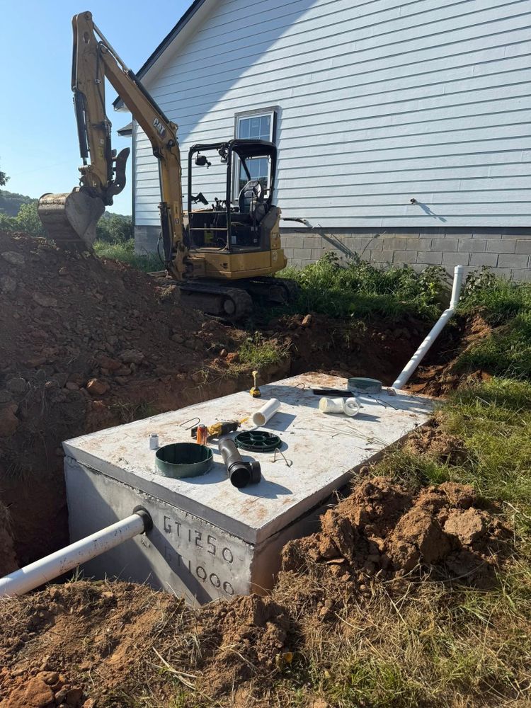 Our Septic System Installation service ensures reliable setup and optimal performance, complemented by expert septic system solutions to maintain system efficiency and prevent costly repairs for homeowners. for Boyd Septic & Utility LLC in West Fork, AR