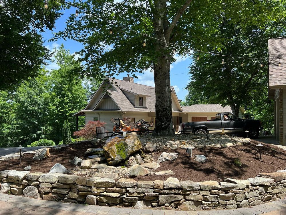 Enhance your outdoor living space with our expert Patio Design & Construction service, offering personalized designs and quality craftsmanship to create a stunning, functional patio tailored to your style and needs. for Smoky Mountain Landscaping in Maryville, TN