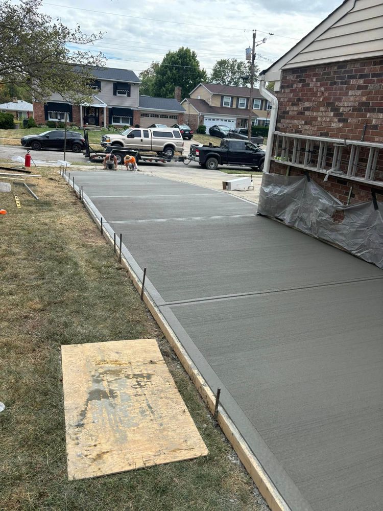 Transform your home's exterior with our professional concrete services. We offer durable driveways, stylish patios, and custom walkways that enhance curb appeal and functionality while ensuring long-lasting quality and satisfaction. for Curtis Concrete Contracting in Trenton, OH