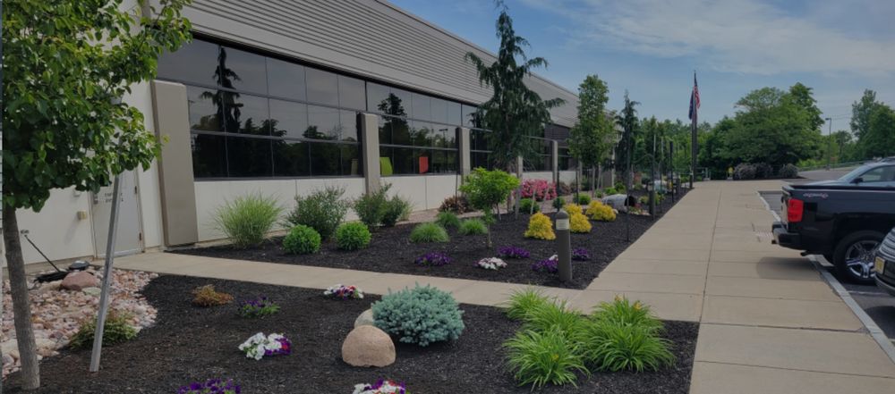 Our landscaping services are designed to enhance the beauty and functionality of both residential and corporate properties. We specialize in garden bed design, shrub and hedge trimming, plant installation, and decorative enhancements to elevate your outdoor space.  for Mow and Go in Syracuse, NY