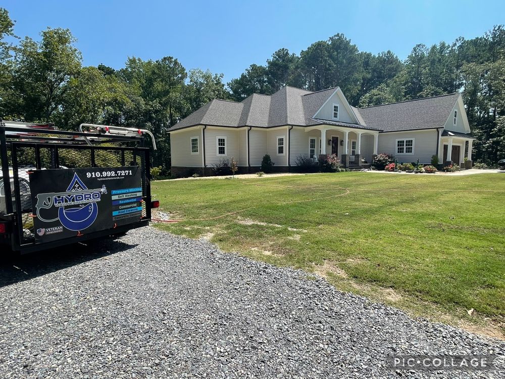 Our Home Softwash service gently removes dirt, algae, and mildew from your home's exterior using low pressure and eco-friendly solutions, ensuring a clean finish without causing damage to surfaces. for Hydro Wash Exteriors LLC in Fayetteville, NC