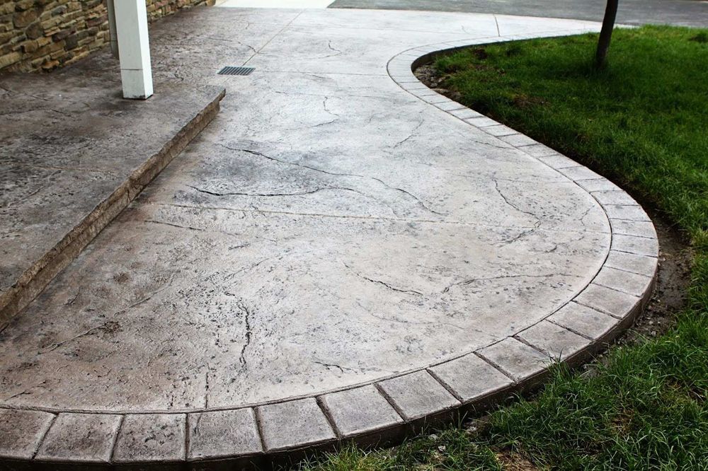 Elevate your outdoor living space with a beautiful Patio Design! Transform your backyard into a stylish, functional oasis with durable and aesthetically pleasing concrete solutions. for Ward Mobile Pour Concrete in Tremonton, UT