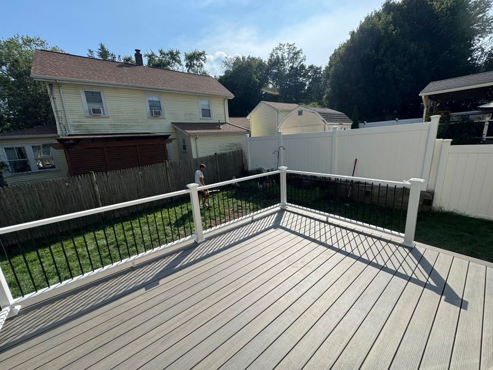 Transform your outdoor space with our expert deck and patio construction services, designed to enhance home aesthetics and functionality using premium materials for durable, beautiful results that suit your lifestyle. for Belfort Builders in Kingston, MA