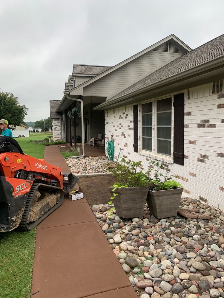 Our Dirt and Rock Work service includes excavation, grading, and stone installation to enhance your landscaping project. We offer professional assistance to transform your outdoor space effectively and efficiently. for Teague Trees & Landscaping in Rendon, TX