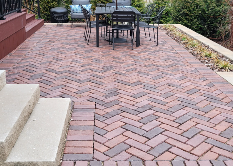 Our Patio Design & Construction service transforms outdoor spaces into beautiful, functional retreat areas, expertly crafted to enhance your home's aesthetics while providing a perfect setting for relaxation and entertaining. for Admiring Landscapes in Lancaster, OH