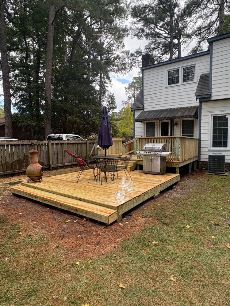 Transform your outdoor space with our premium decking service. We offer durable, stylish designs tailored to enhance your home's beauty and functionality, ensuring an inviting area for relaxation and entertainment. for TG Fencing LLC in Farmville, NC