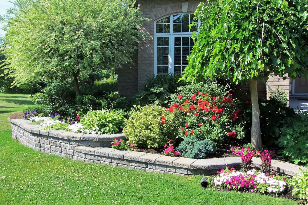 Our retaining wall construction service enhances your landscape with durable, visually appealing walls designed to prevent soil erosion, provide structural support, and create beautiful outdoor spaces tailored to your property needs. for Countryside lawn pros in Upstate, SC