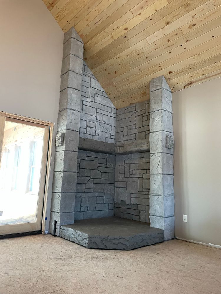 Interior fireplace & feature walls  for STAMPEDE Vertical Concrete in Isanti, Minnesota