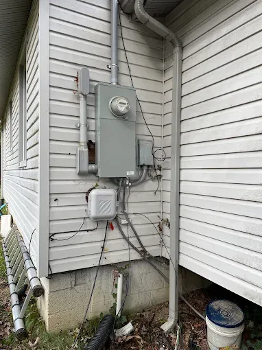 Enhance your home's safety and efficiency with our Electrical Panel Upgrades. Our expert technicians ensure reliable power distribution, accommodating modern appliances while reducing the risk of electrical hazards. for Bluegrass Electrical LLC in Marshall, NC