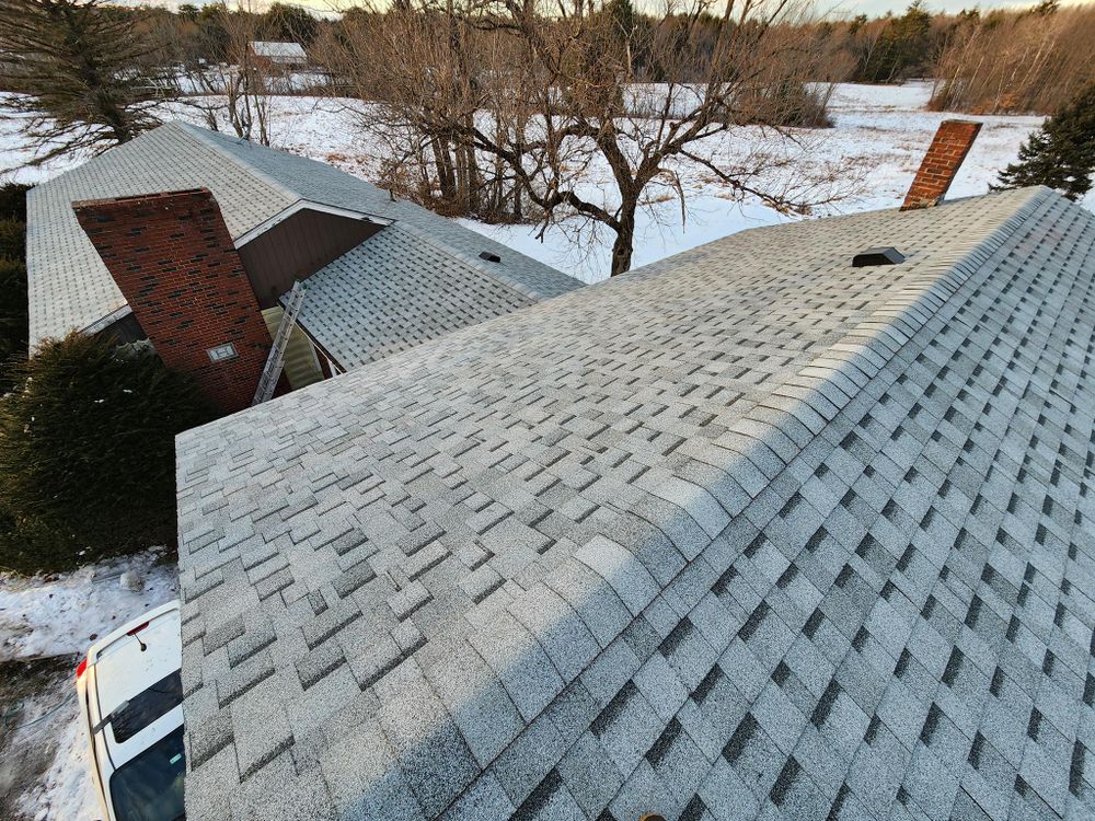 Our comprehensive Shingles service offers durable, high-quality roofing solutions designed to enhance the aesthetic appeal and longevity of your home, ensuring reliable protection against weather elements. Trust in our expert installation and repairs. for Maine Roofing and Siding in Richmond, ME