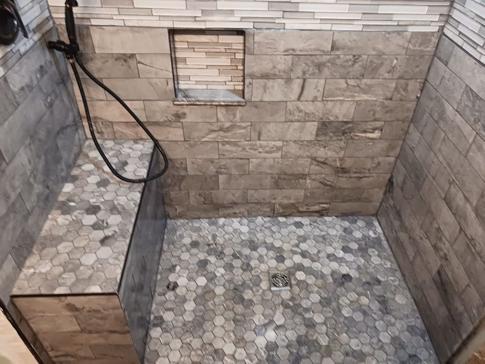 Transform your bathroom with our professional bathroom renovation service, offering exceptional craftsmanship, innovative design solutions, and high-quality materials to create a stunning space tailored to your needs and style. for DCA Carpentry Solutions LLC in Brook Park, OH