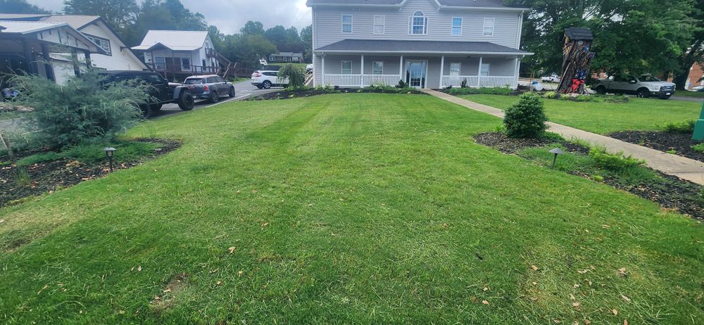 Our professional mowing service ensures your lawn is expertly trimmed and maintained, enhancing the overall beauty of your property and creating a well-manicured outdoor space for you to enjoy. for JC Landscapers in Ellijay, GA