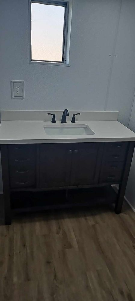 Transform your space with our professional bathroom renovation services, offering expert craftsmanship and innovative design to create a beautiful, functional bathroom that exceeds your expectations and adds value to your home. for Willy Lewallen And Sons Construction in Mineral Wells, TX